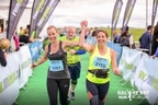 Jill Quilty, Nodlaig Caffrey pictured crossing the finish line of the Run Galway Bay on the 7th of Oct 2017.
